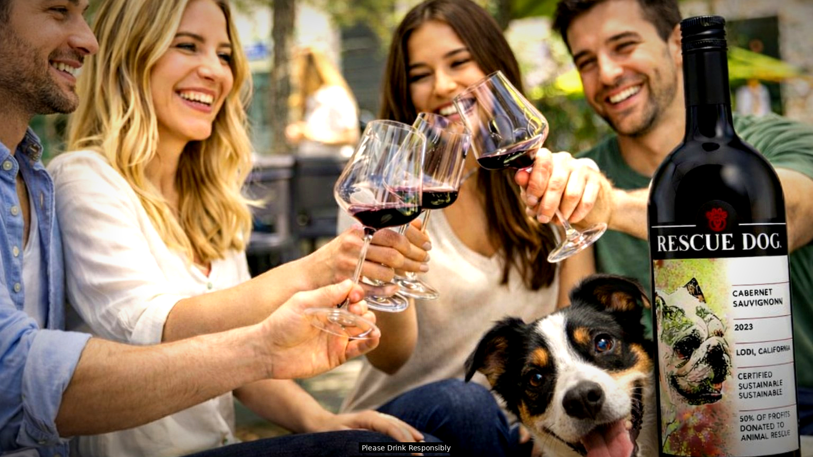 Couple sharing Rescue Dog Wines with their rescue dog